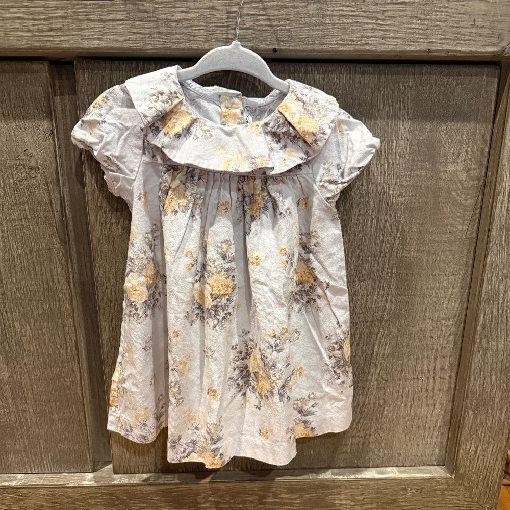 Pale blue collared dress with yellow flowers